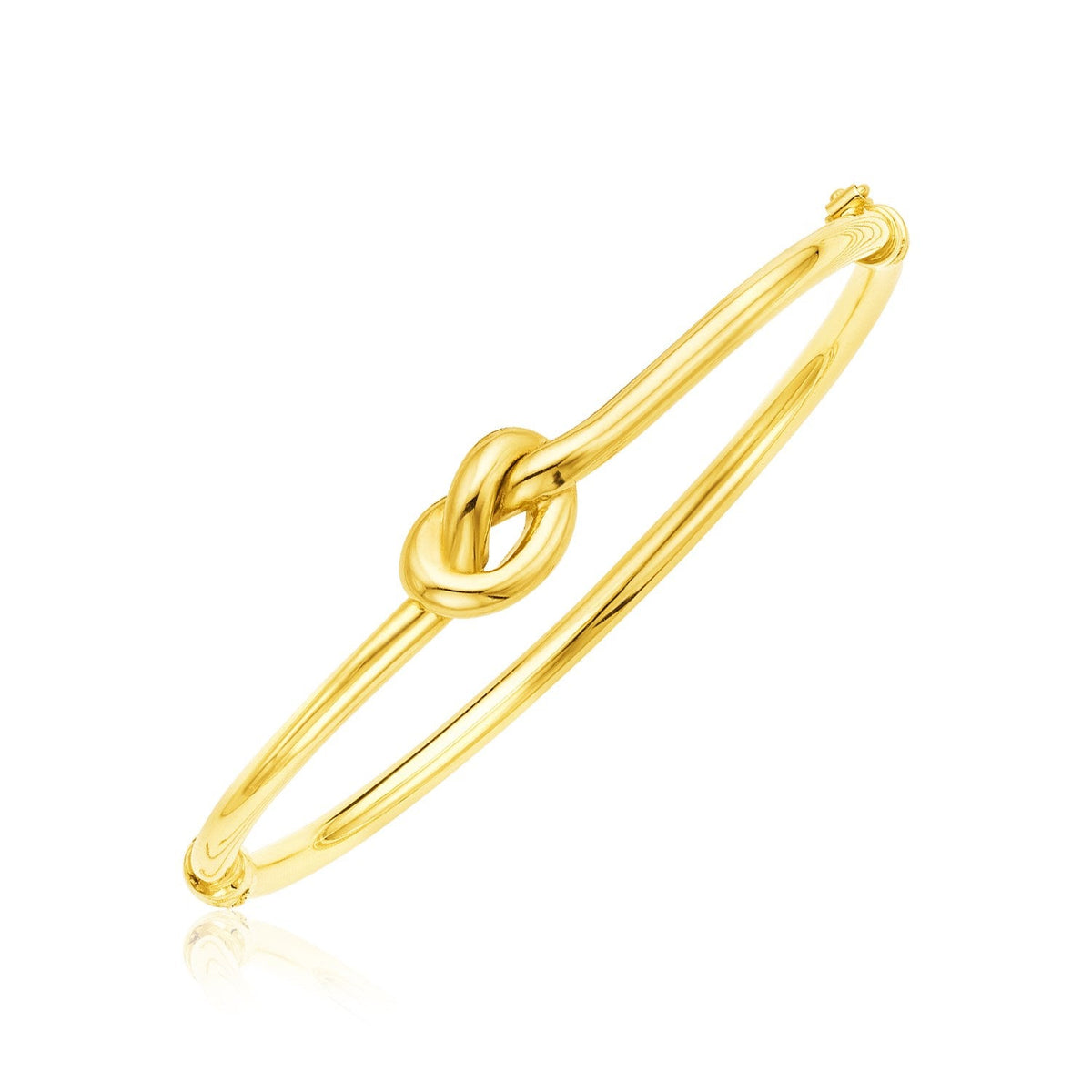 14k yellow gold bangle bracelet with polished knot by Avera Group