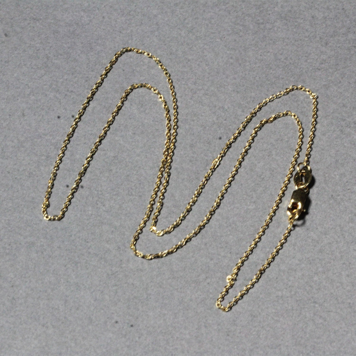 18k yellow gold diamond-cut cable link chain, 0.8mm by Avera Group, view 6