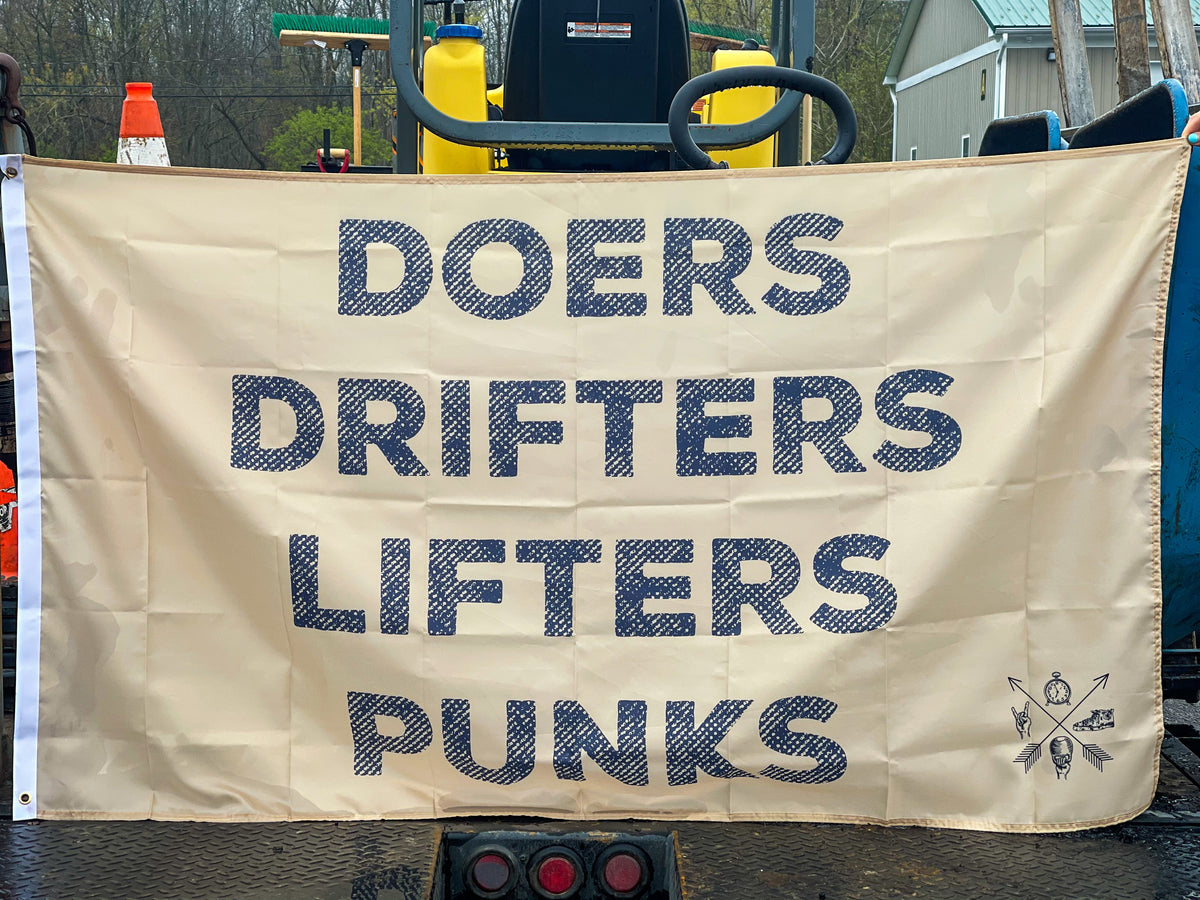 Doers Drifters Lifters Punks - Flag by Tango Charlie Apparel