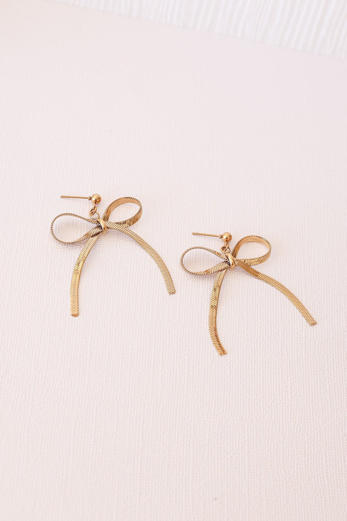 Lauren Bow Dangle by Rose & Clay