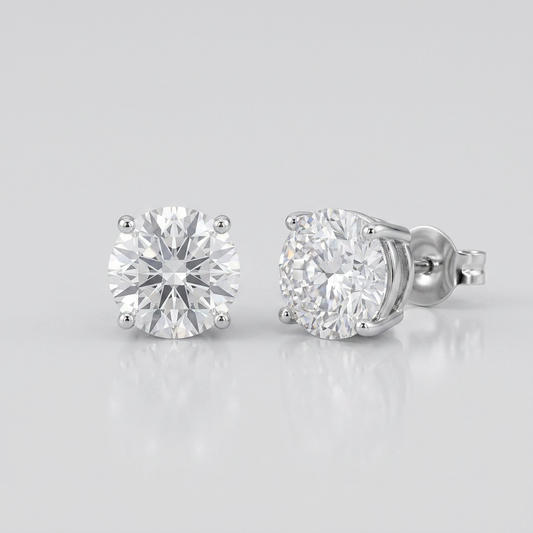 Sterling Silver Stud Earrings with White Hue Faceted Cubic Zirconia by Avera Group