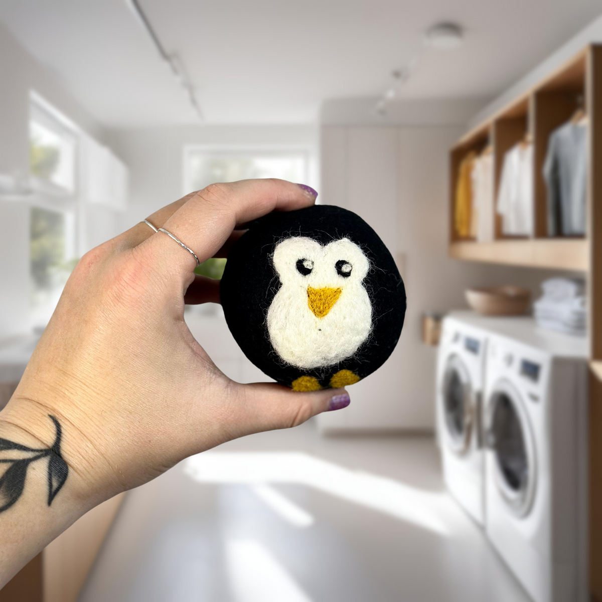 Organic wool dryer balls in Waddle The Penguin design