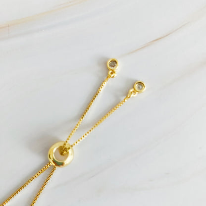 Mesmerized By The Cross Slide Bracelet by Fuchsia Hercules