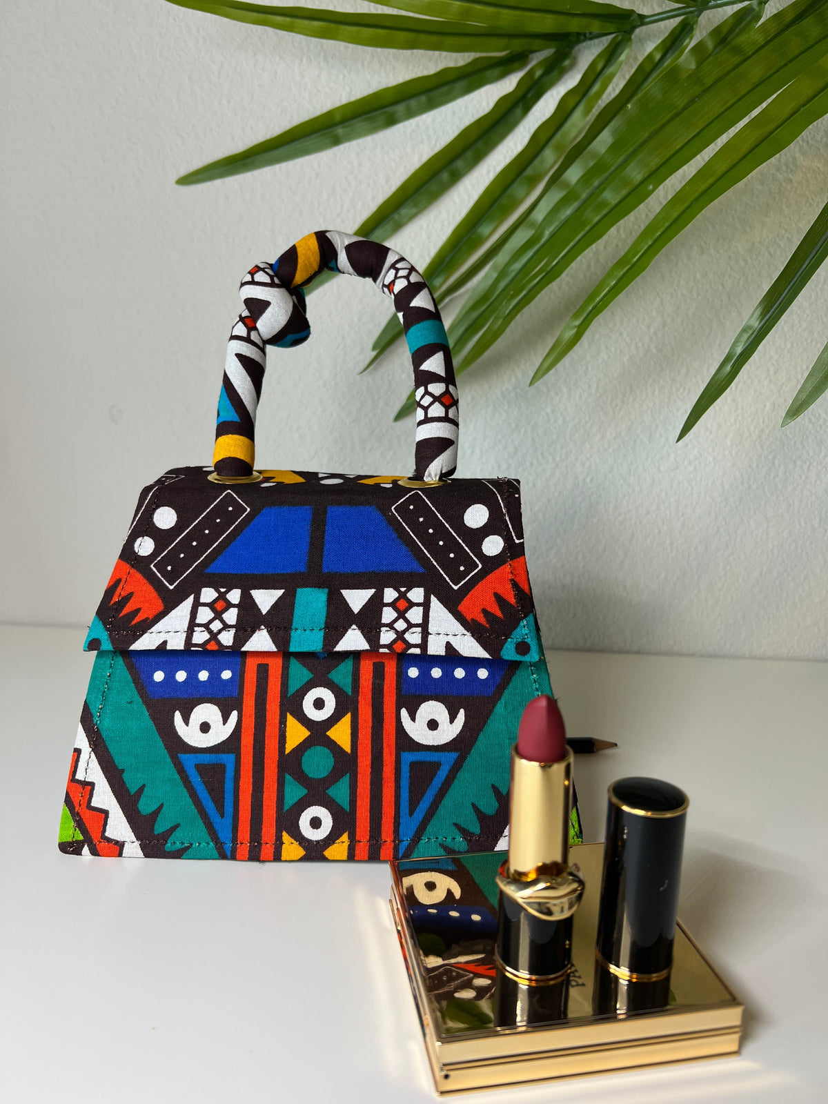 Knot African print mini bag with chain strap