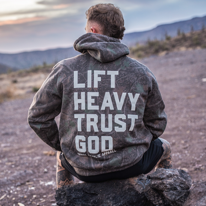 Lift Heavy. Trust God. - Premium Darkwood Camo Hoodie by Tango Charlie Apparel