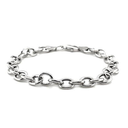 Sterling Silver Rhodium Plated Fancy Charm Bracelet (6.70 mm) by Avera Group