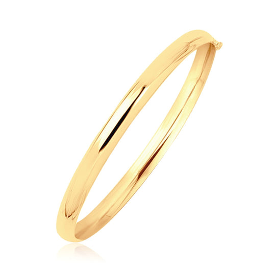 Children's 14k yellow gold polished dome bangle by Avera Group