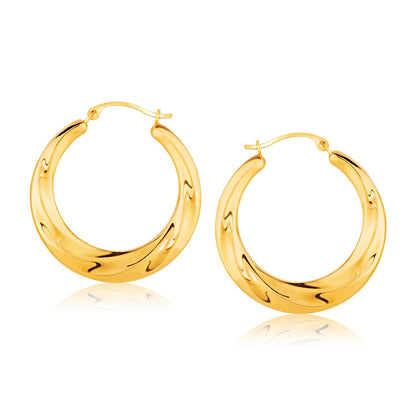 14k yellow gold graduated textured hoop earrings by Avera Group
