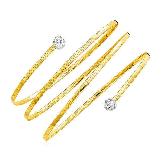 14k two-tone gold spiral wraparound bangle with diamonds by Avera Group