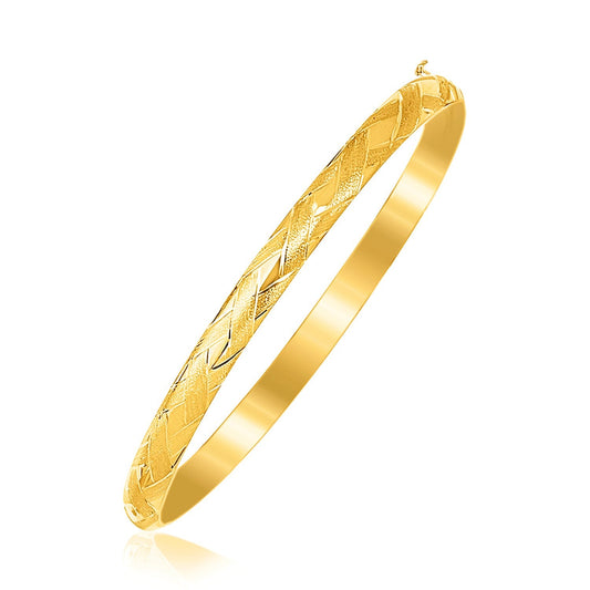 14k yellow gold kids' bangle with woven diamond-cut detail, Avera Group