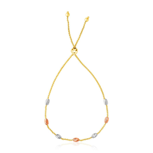 14k tri-color gold textured oval station lariat style bracelet by Avera Group
