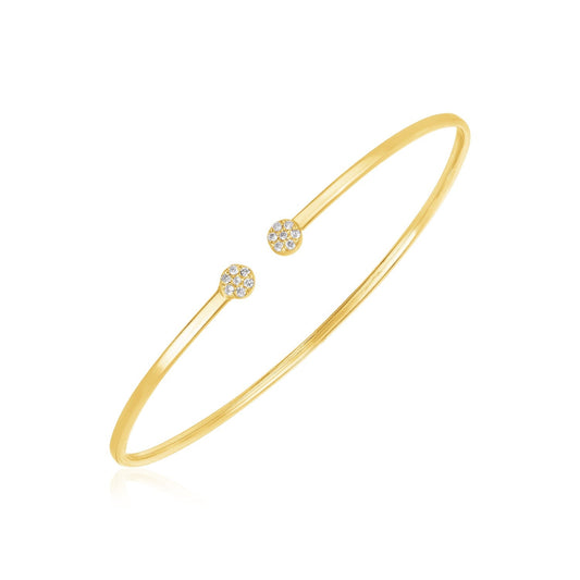 14k yellow gold pave diamond cluster bangle by Avera Group