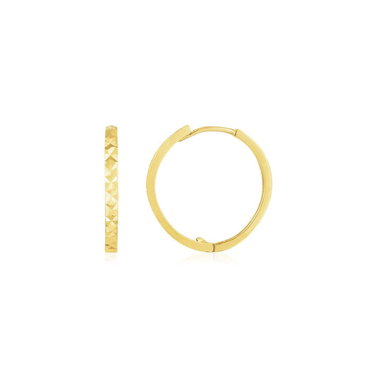 14k yellow gold diamond-cut textured round huggie earrings by Avera Group