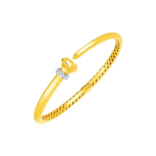 14k yellow gold hinged bangle with a band of diamonds by Avera Group