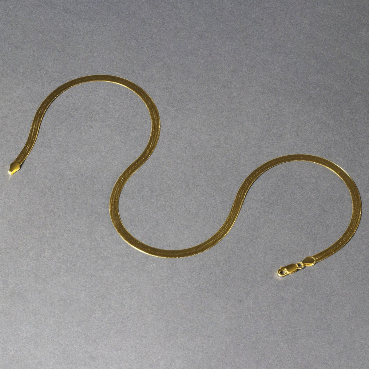 6.0mm 14k yellow gold super flex herringbone chain by Avera Group, view 4