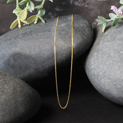 14k yellow gold oval cable link chain, 0.85mm by Avera Group, view 4