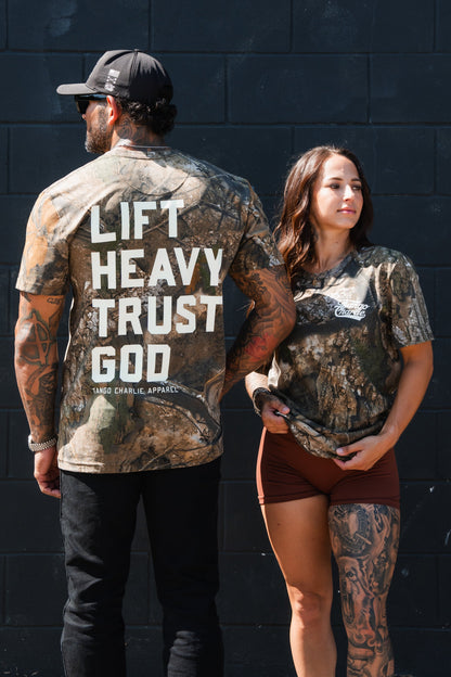 Lift Heavy. Trust God. - Realtree Premium Camo Tee by Tango Charlie Apparel