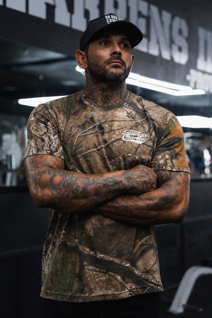 Lift Heavy. Trust God. - Realtree Premium Camo Tee by Tango Charlie Apparel