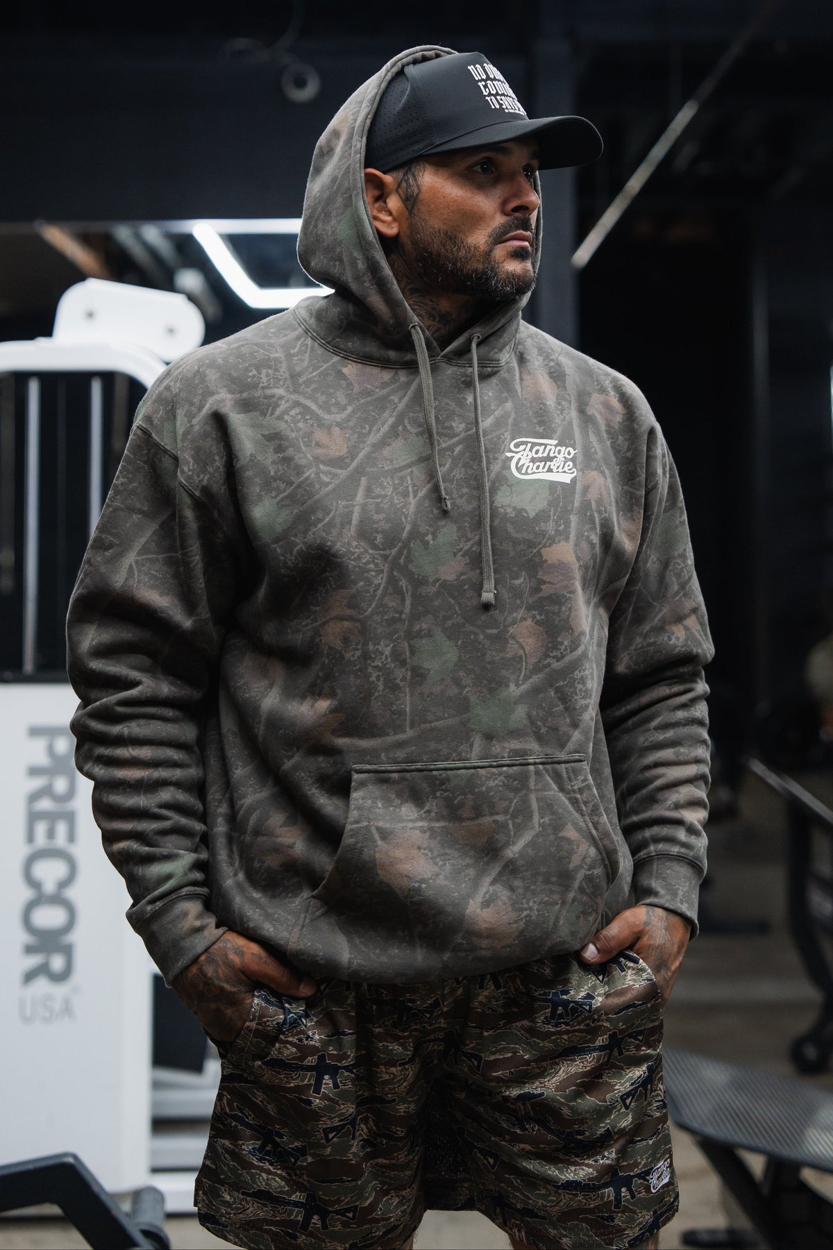 Lift Heavy. Trust God. - Premium Darkwood Camo Hoodie by Tango Charlie Apparel
