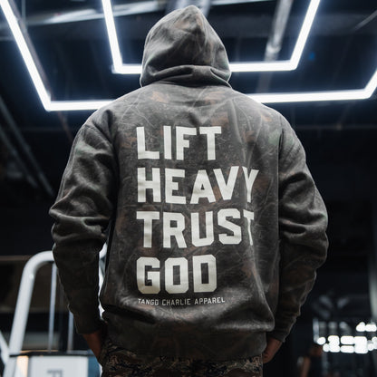 Lift Heavy. Trust God. - Premium Darkwood Camo Hoodie by Tango Charlie Apparel
