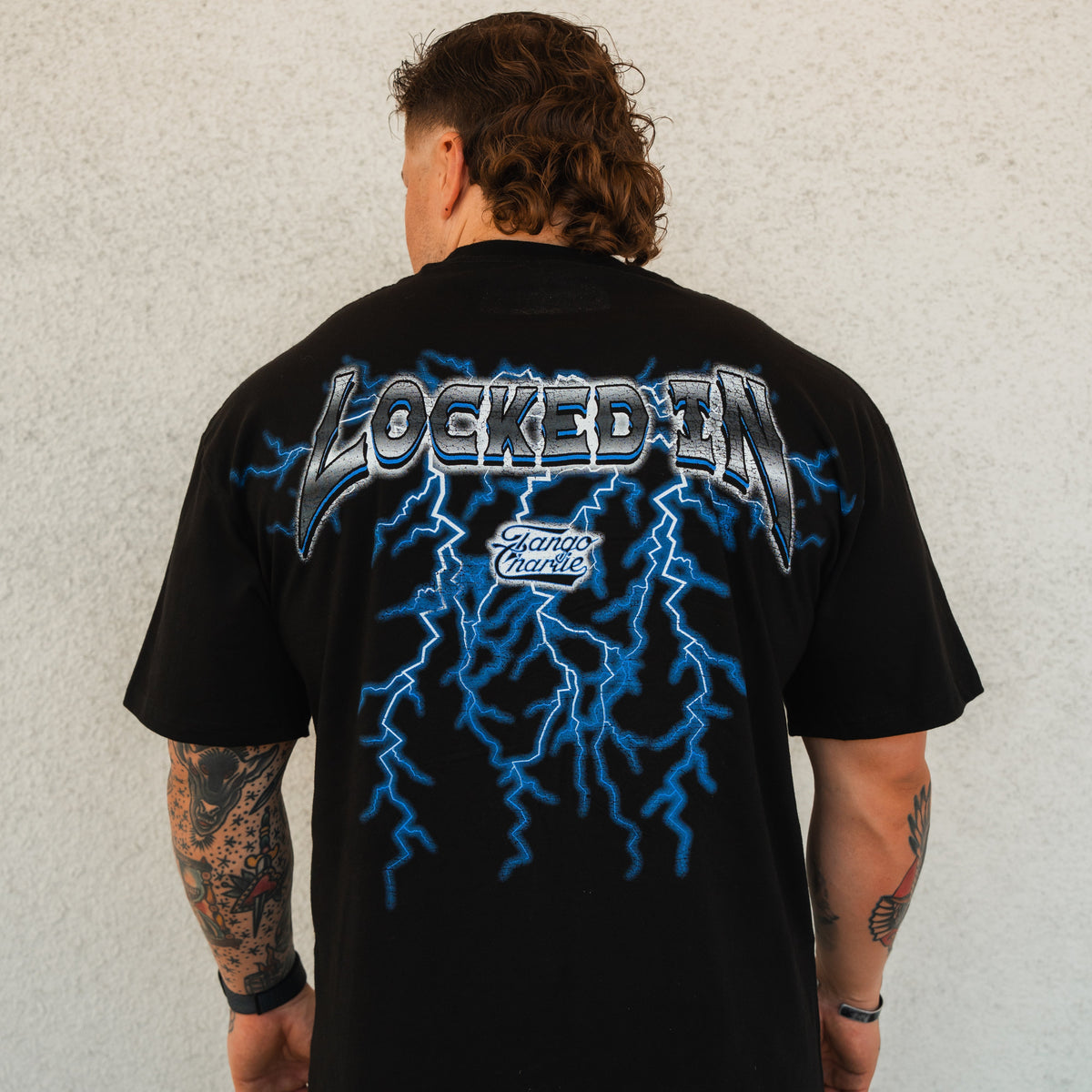 Locked In - Premium Oversized Tee by Tango Charlie Apparel