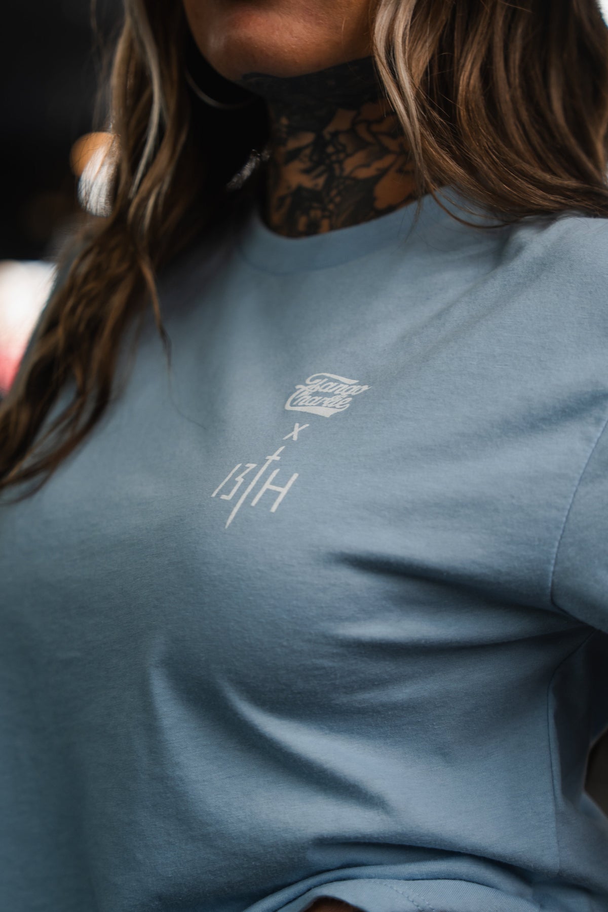 Lift Heavy. Pray Hard. - Baby Blue Women's Crop Tee by Tango Charlie Apparel