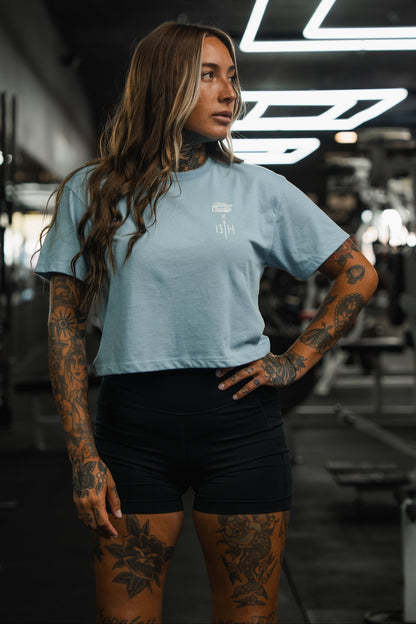 Lift Heavy. Pray Hard. - Baby Blue Women's Crop Tee by Tango Charlie Apparel