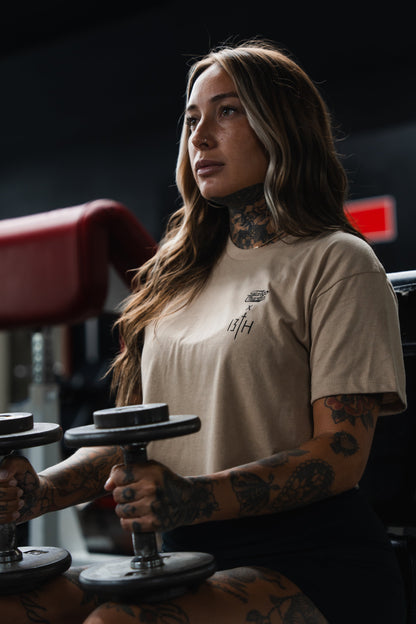 Lift Heavy. Pray Hard. - Sand Women's Crop Tee by Tango Charlie Apparel