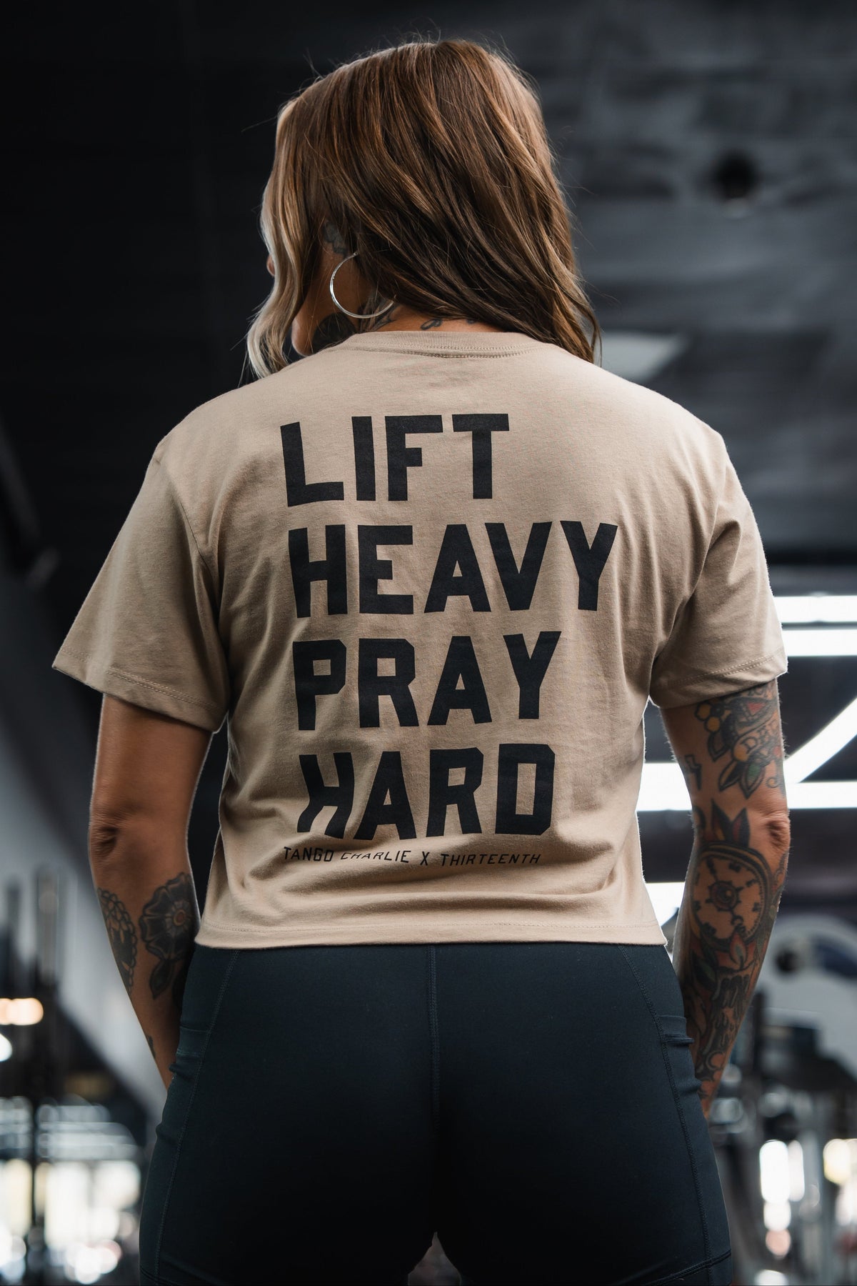 Lift Heavy. Pray Hard. - Sand Women's Crop Tee by Tango Charlie Apparel
