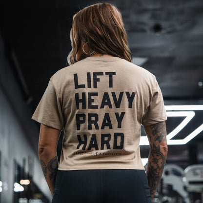 Lift Heavy. Pray Hard. - Sand Women's Crop Tee by Tango Charlie Apparel