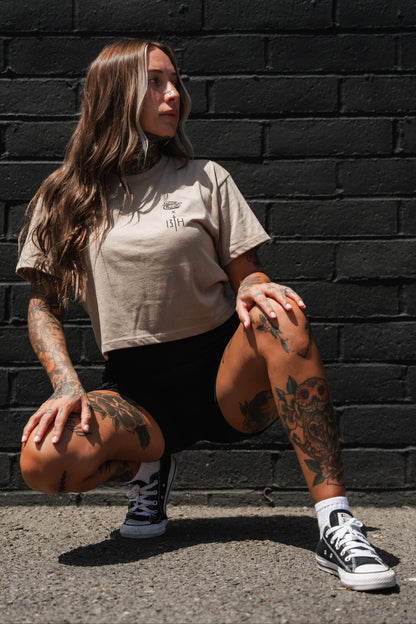 Lift Heavy. Pray Hard. - Sand Women's Crop Tee by Tango Charlie Apparel