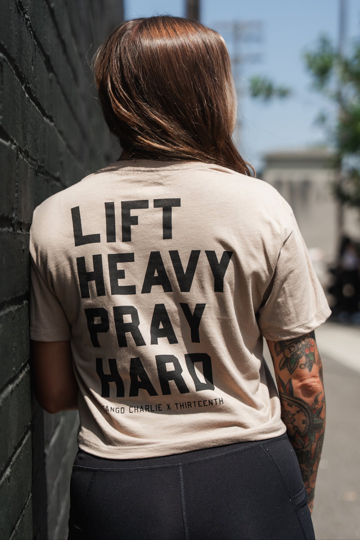 Lift Heavy. Pray Hard. - Sand Women's Crop Tee by Tango Charlie Apparel