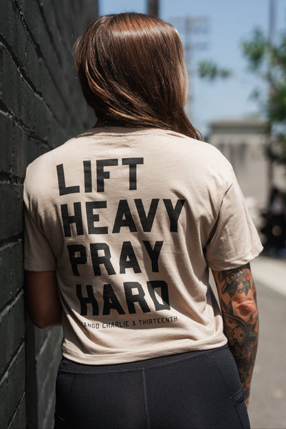 Lift Heavy. Pray Hard. - Sand Women's Crop Tee by Tango Charlie Apparel