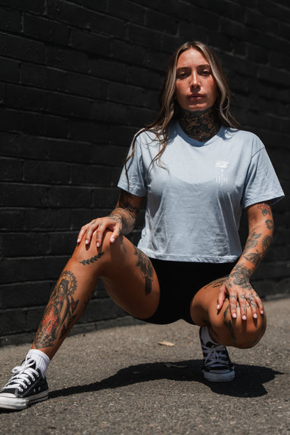 Lift Heavy. Pray Hard. - Baby Blue Women's Crop Tee by Tango Charlie Apparel