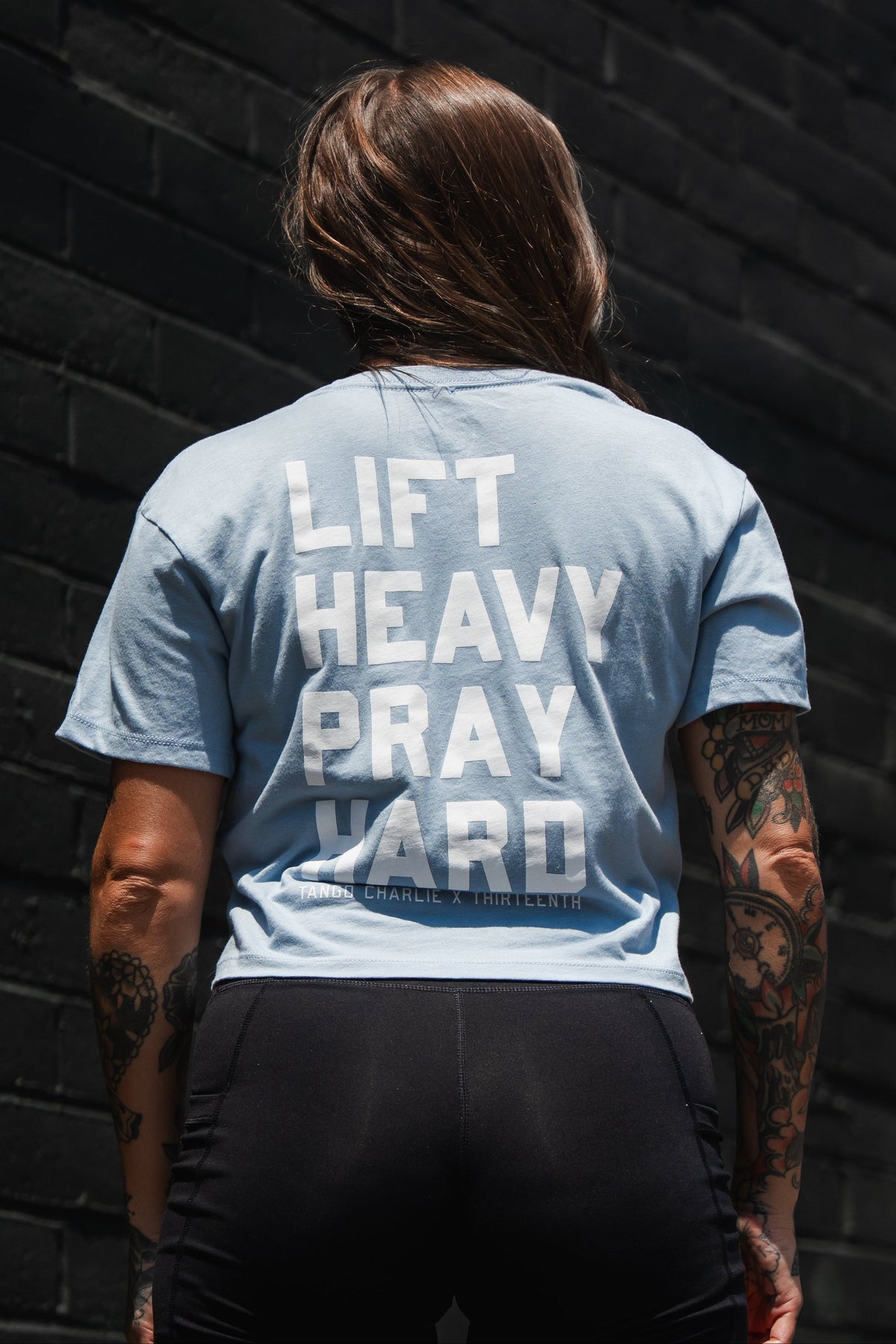 Lift Heavy. Pray Hard. - Baby Blue Women's Crop Tee by Tango Charlie Apparel