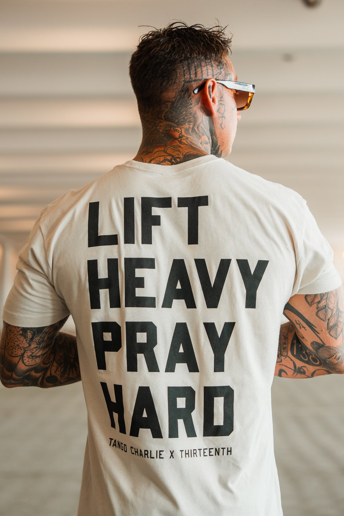 Lift Heavy. Pray Hard. - Tee by Tango Charlie Apparel