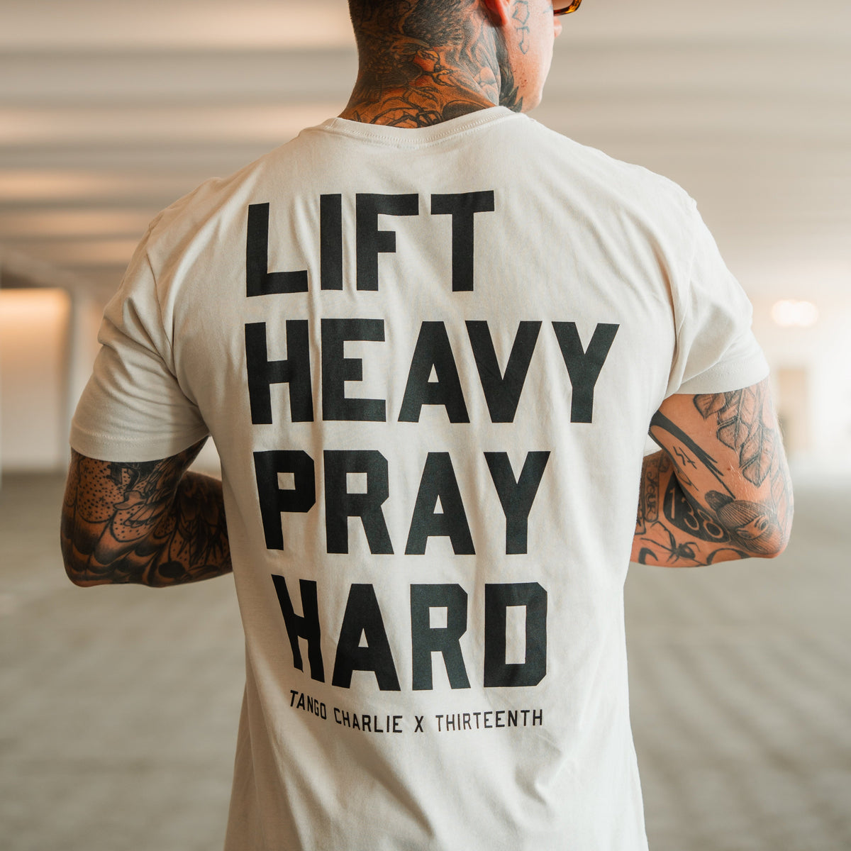 Lift Heavy. Pray Hard. - Tee by Tango Charlie Apparel