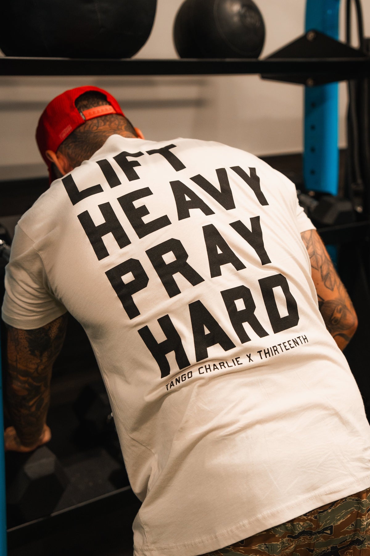 Lift Heavy. Pray Hard. - Tee by Tango Charlie Apparel