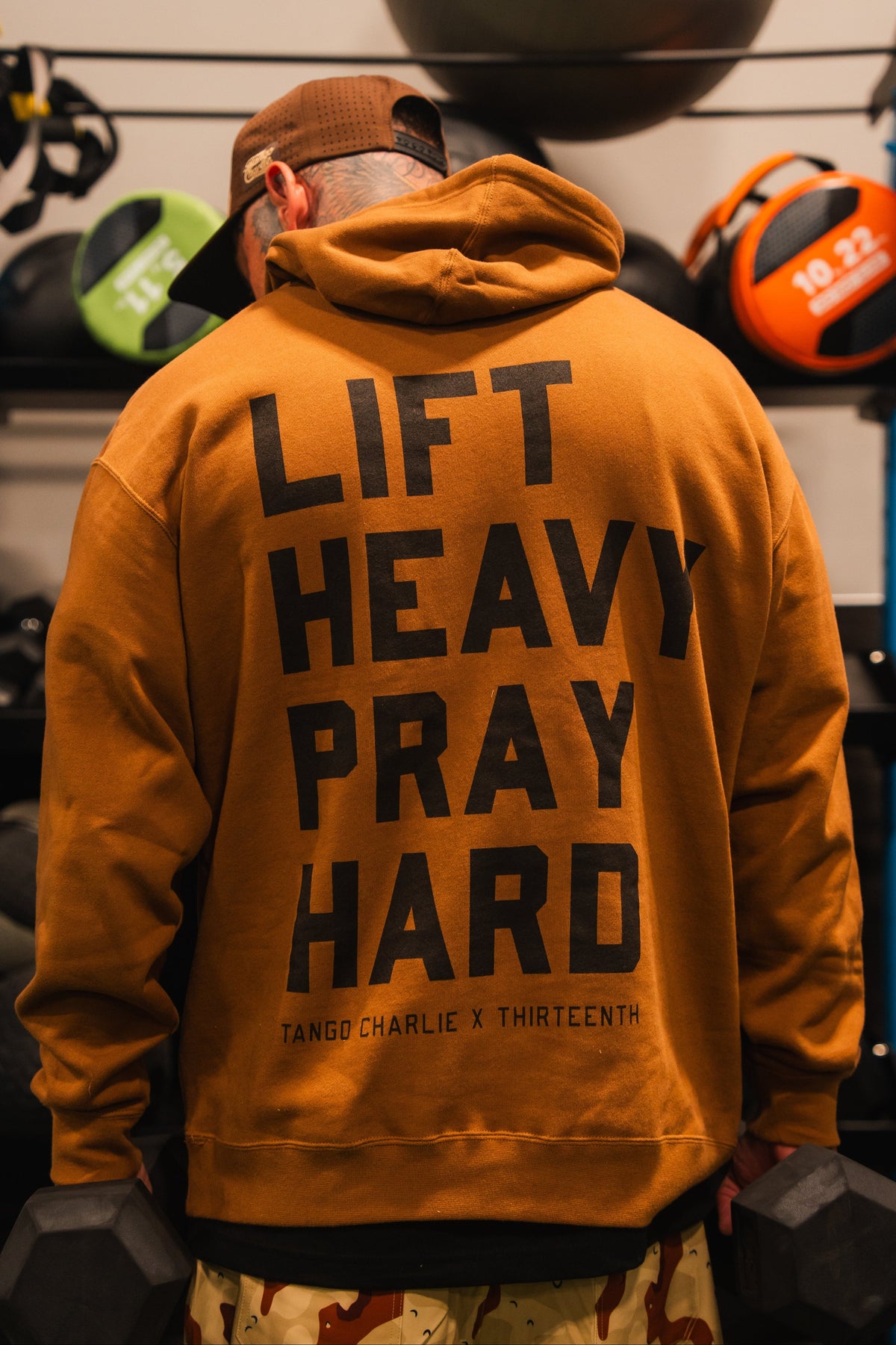 Lift Heavy. Pray Hard. - Hoodie by Tango Charlie Apparel