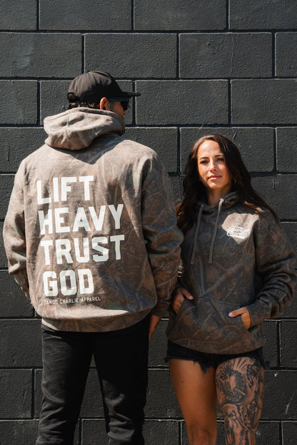 Lift Heavy. Trust God. - Premium Darkwood Camo Hoodie by Tango Charlie Apparel