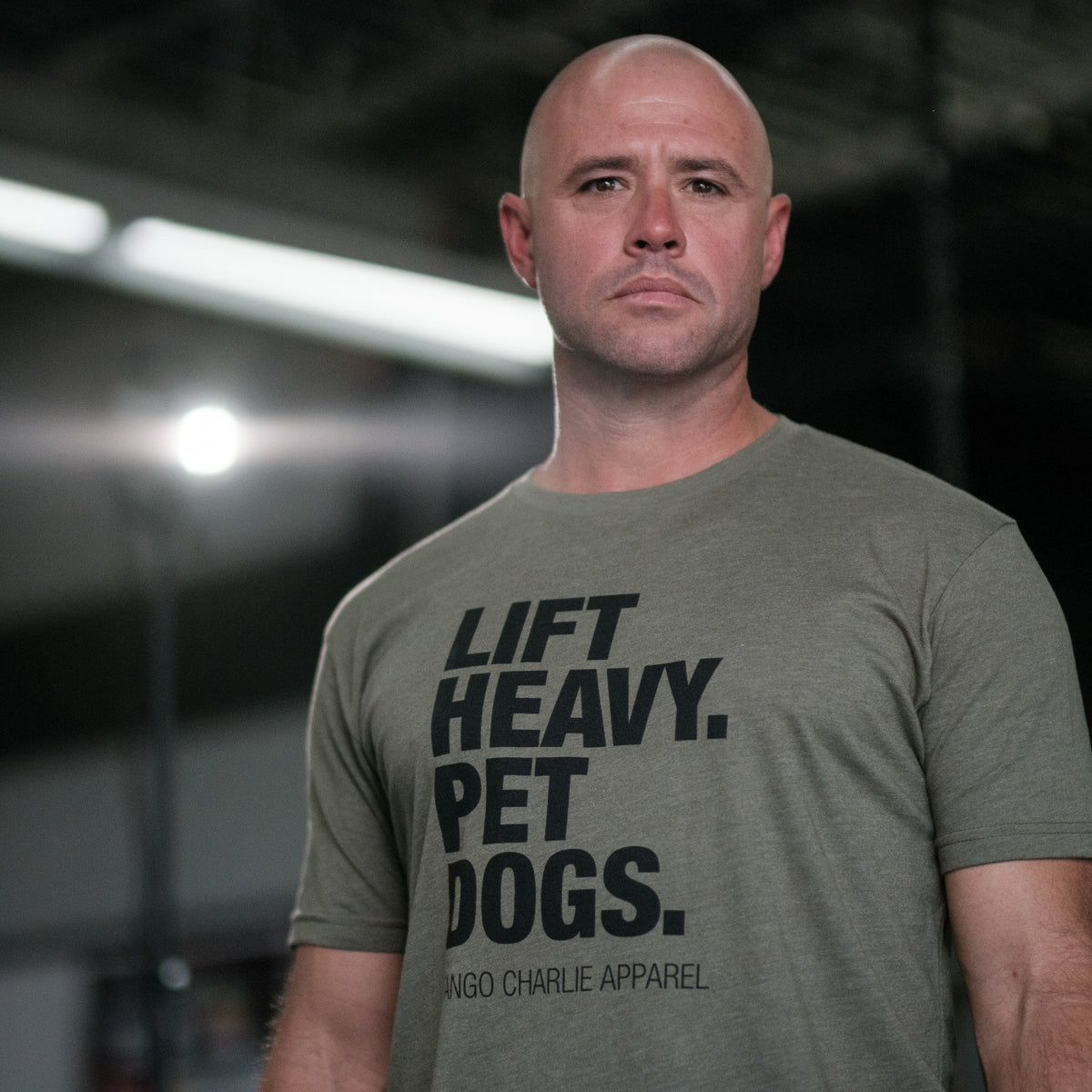 Lift Heavy. Pet Dogs. - Tee by Tango Charlie Apparel