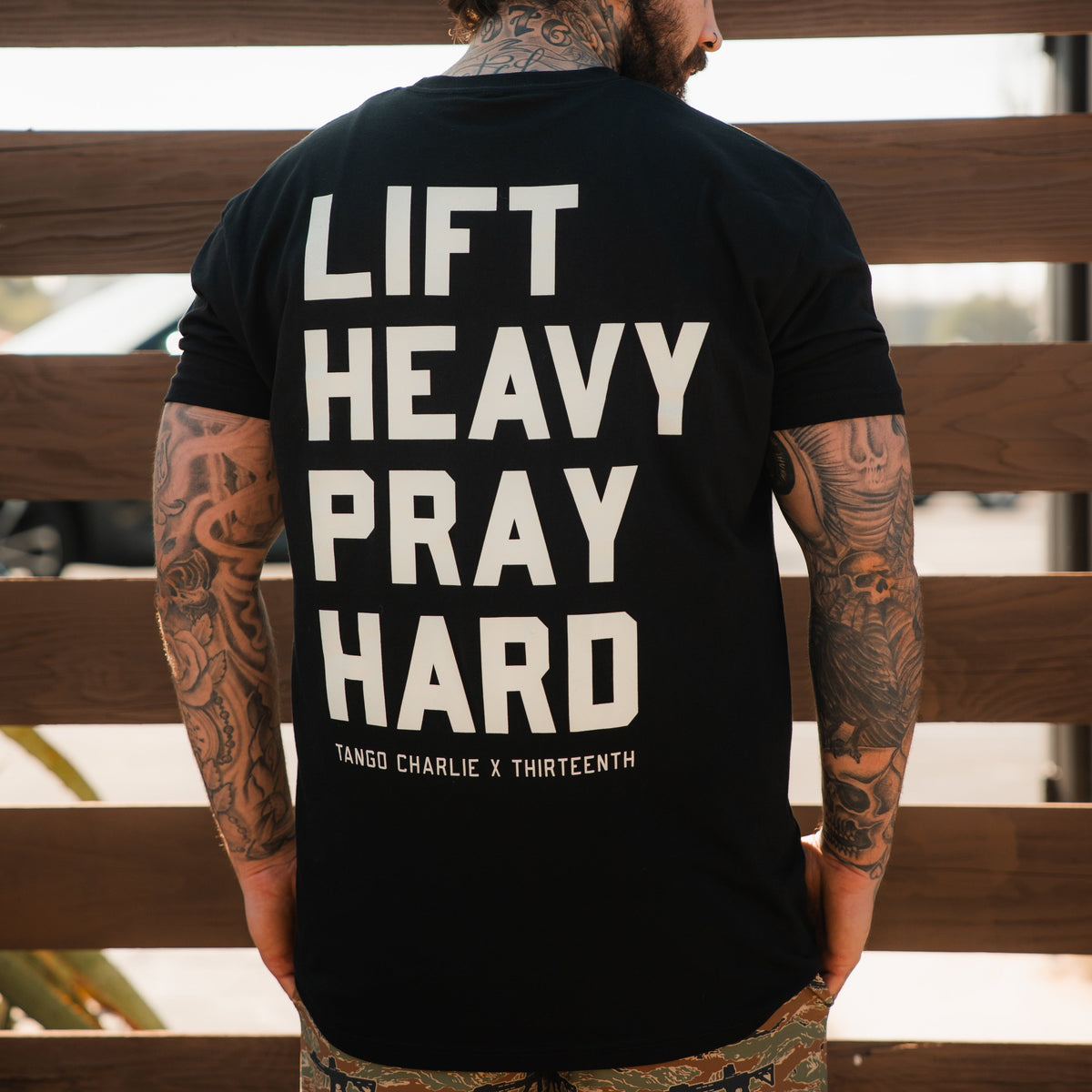 Lift Heavy. Pray Hard. - Black Tee by Tango Charlie Apparel