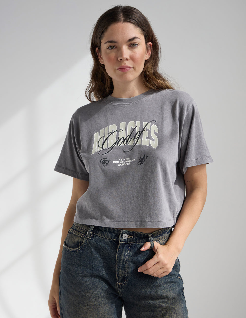 God of Miracles Cropped Women's Tee by Elevated Faith