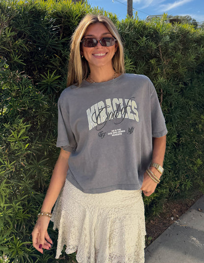 God of Miracles Cropped Women's Tee by Elevated Faith