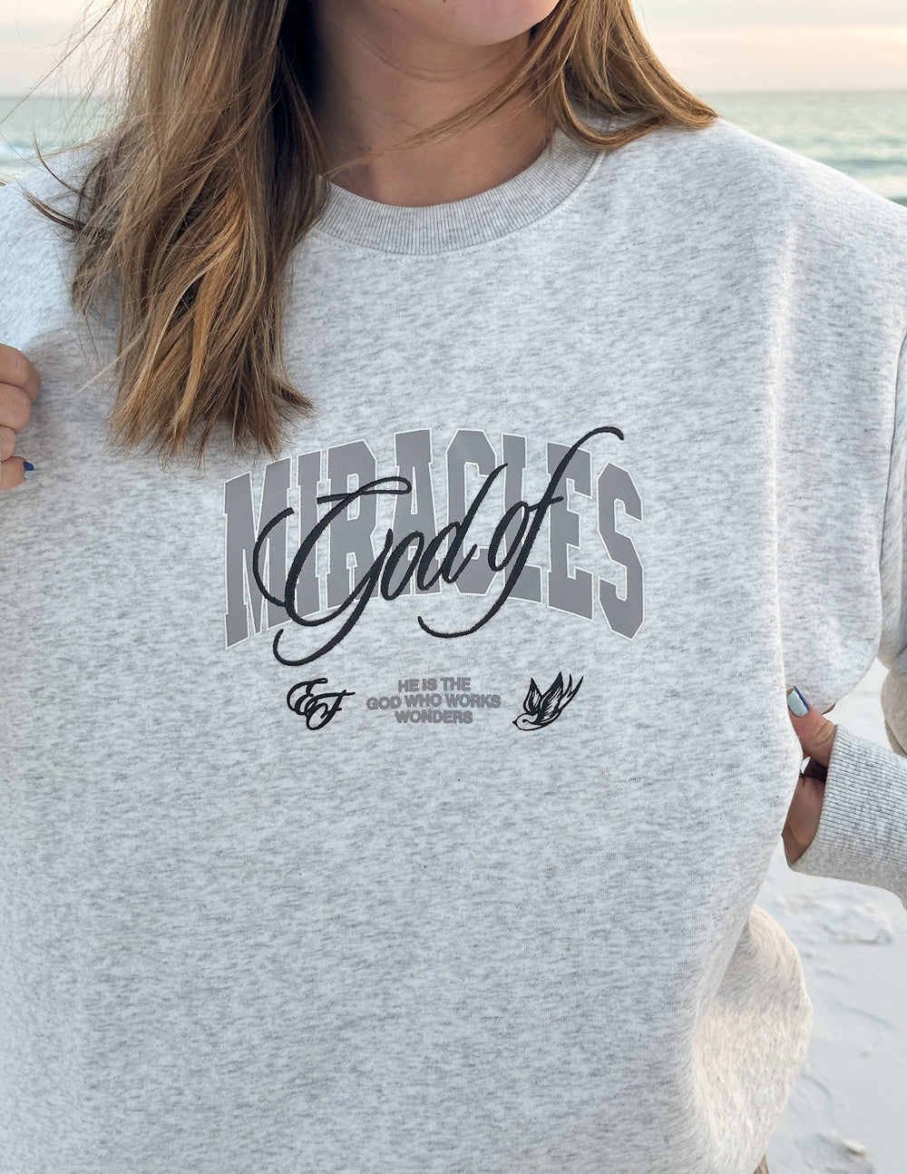 God of Miracles Unisex Crewneck by Elevated Faith