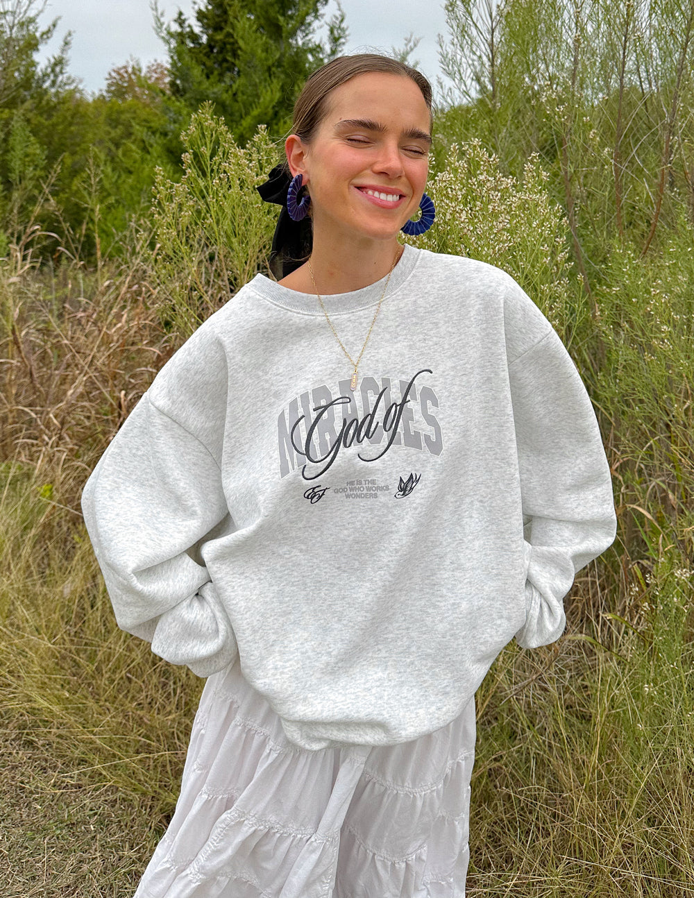 God of Miracles Unisex Crewneck by Elevated Faith
