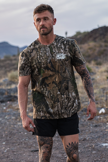 Lift Heavy. Trust God. - Realtree Premium Camo Tee by Tango Charlie Apparel