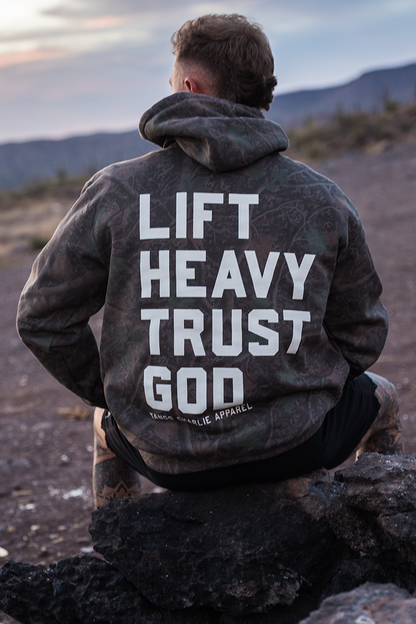 Lift Heavy. Trust God. - Premium Darkwood Camo Hoodie by Tango Charlie Apparel