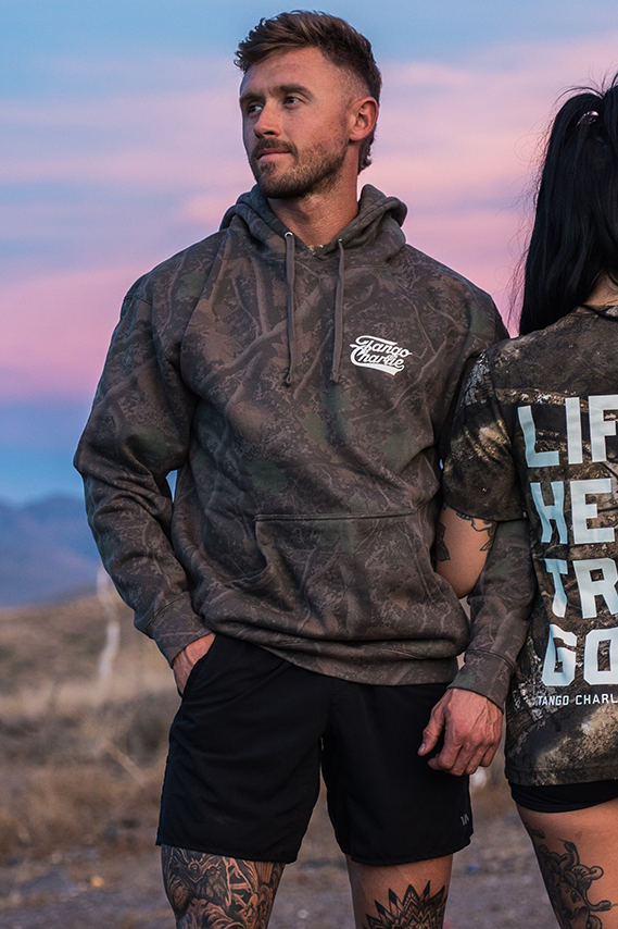 Lift Heavy. Trust God. - Premium Darkwood Camo Hoodie by Tango Charlie Apparel