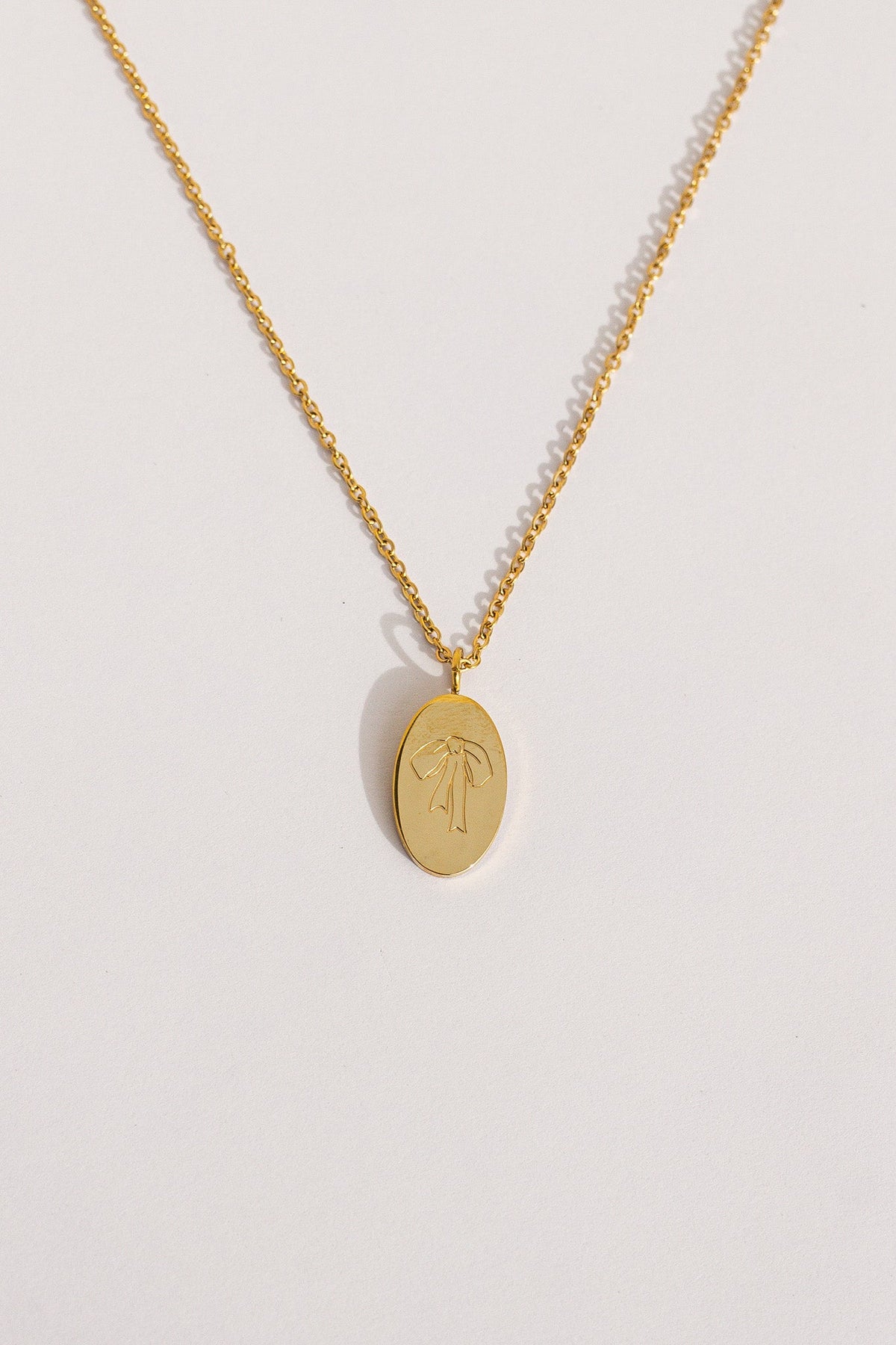 Bow Pendant Necklace by Rose & Clay